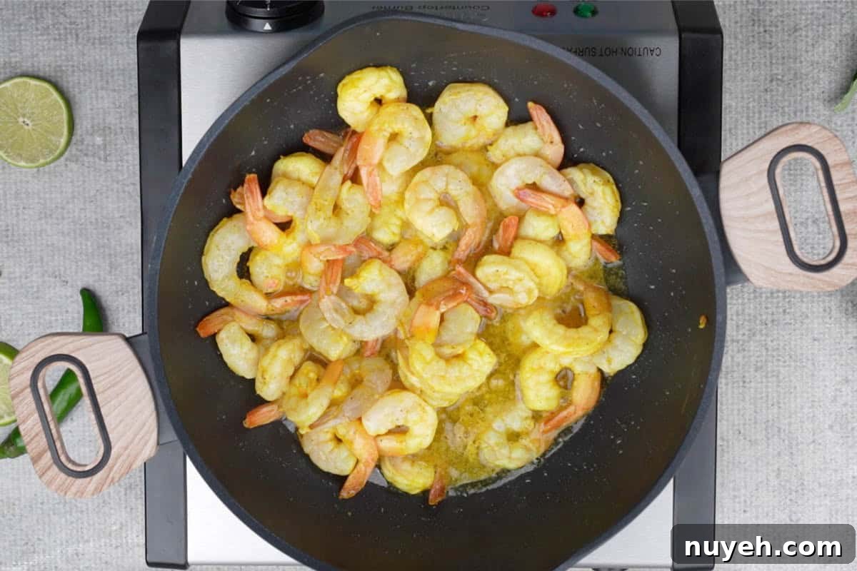Shrimp frying in hot oil.
