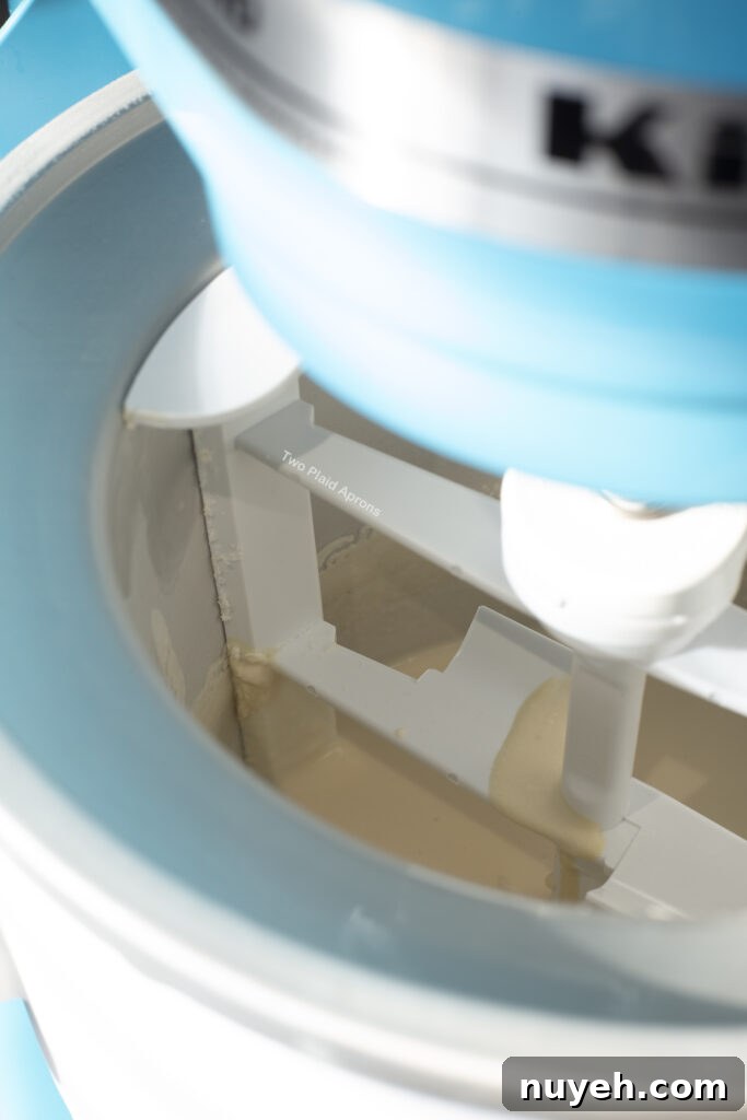 Churning coconut ice cream in kitchen aide.