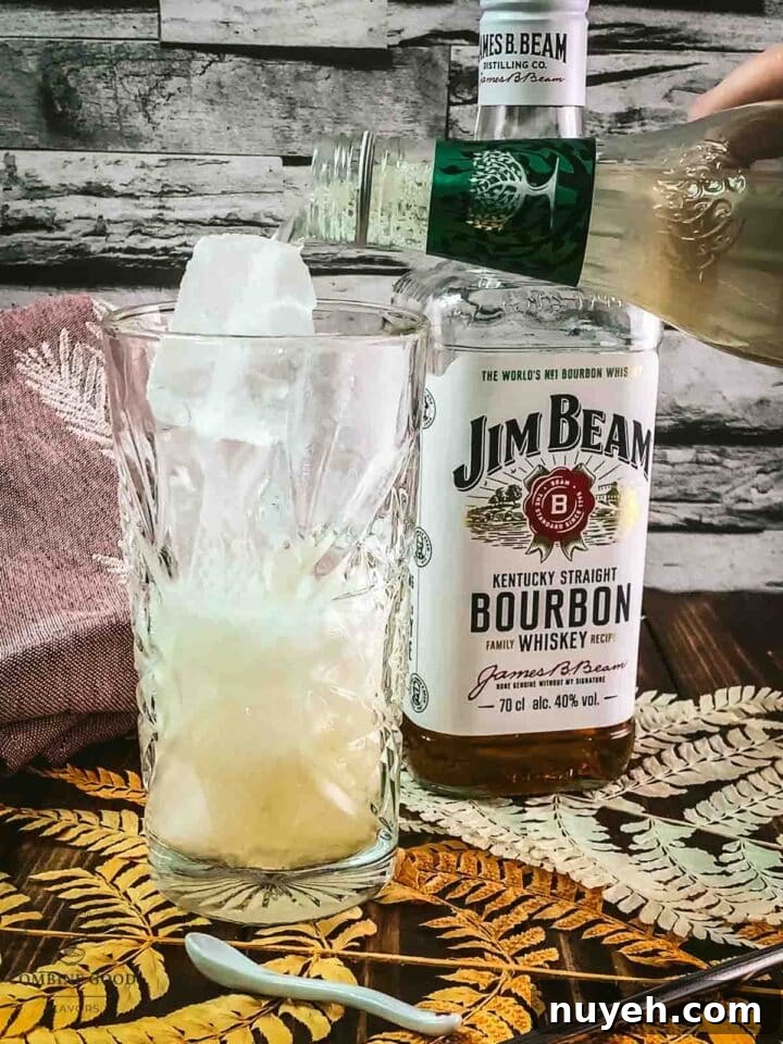 Top with ginger beer.
