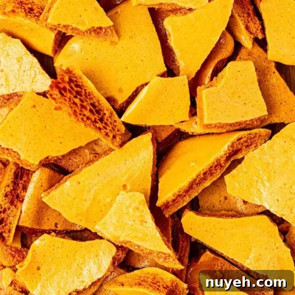 A close up of lots of pieces of homemade honeycomb.