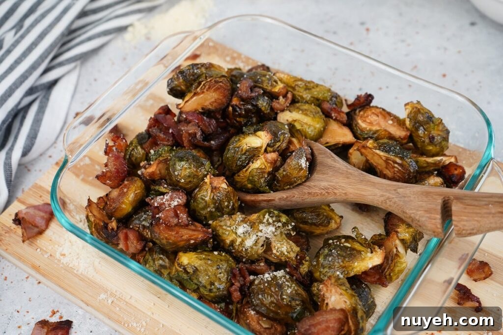 Finished smoked Brussels sprouts with grated parmesan