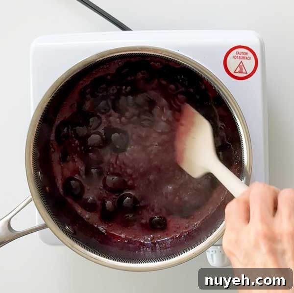 Cherry Compote in 15 Minutes: Dessert Topping Recipe 6 Simmering the cherry compote for ten minutes until cherries are soft.
