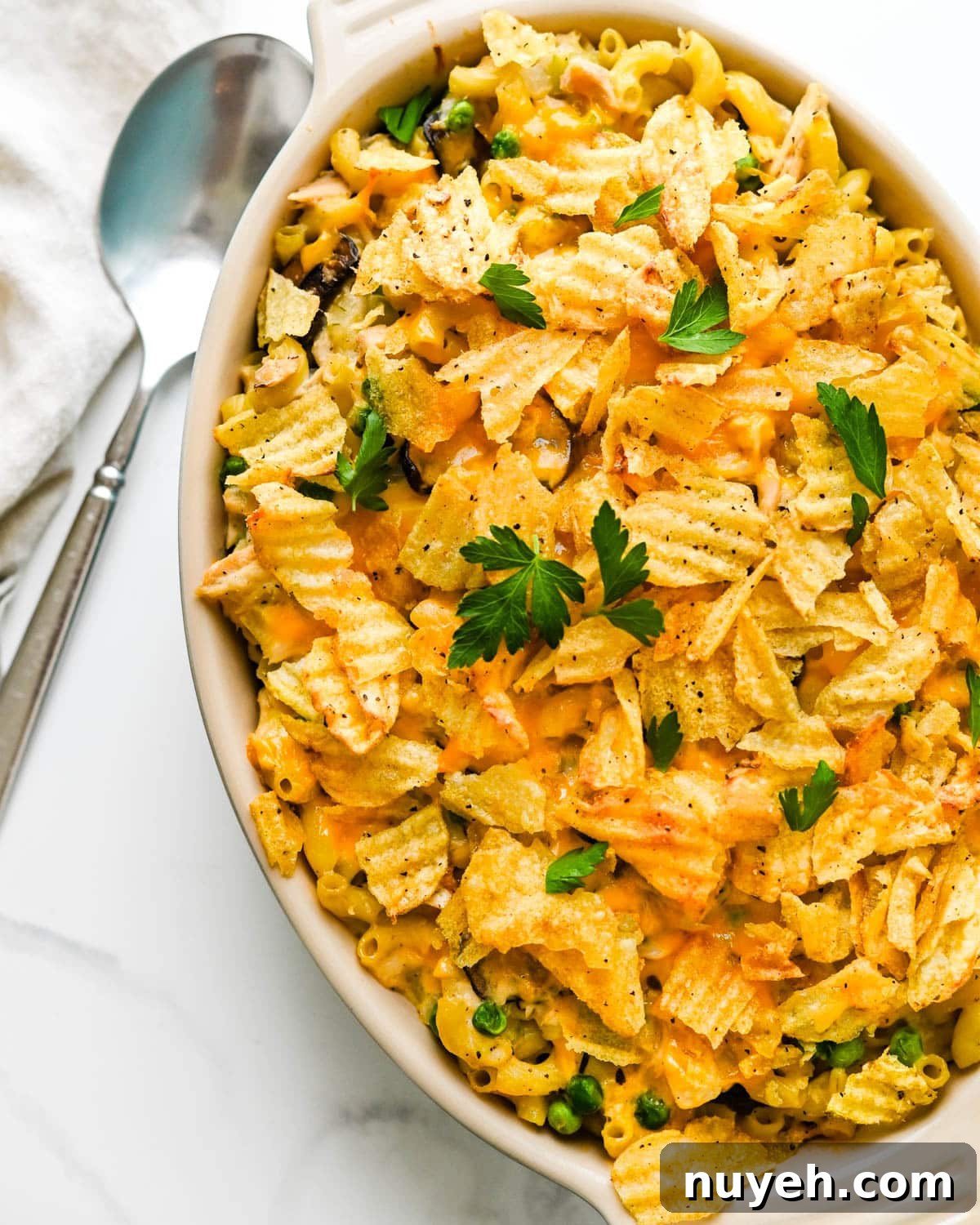 Creamy Tuna Noodle Casserole with Crispy Crumbs 11 Serving tuna noodle casserole with potato chip crust.