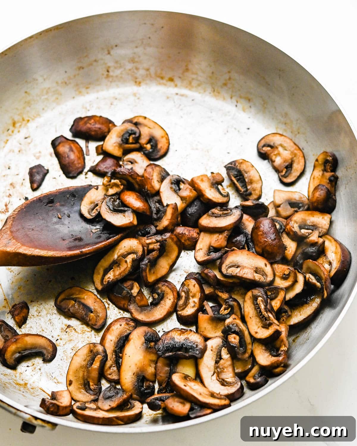 Creamy Tuna Noodle Casserole with Crispy Crumbs 3 Sautéing mushrooms.