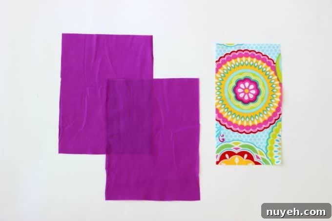 A 2 sided tissue holder pouch is perfect for cold and flu season. One side can hold a pack of tissues, the other side can hold a mini bottle of sanitizer and a lip gloss!
