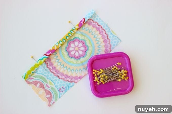A 2 sided tissue holder pouch is perfect for cold and flu season. One side can hold a pack of tissues, the other side can hold a mini bottle of sanitizer and a lip gloss!
