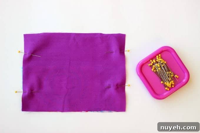 A 2 sided tissue holder pouch is perfect for cold and flu season. One side can hold a pack of tissues, the other side can hold a mini bottle of sanitizer and a lip gloss!