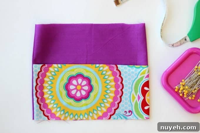 A 2 sided tissue holder pouch is perfect for cold and flu season. One side can hold a pack of tissues, the other side can hold a mini bottle of sanitizer and a lip gloss!