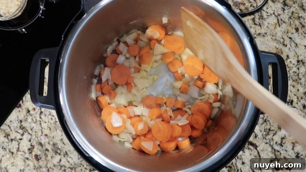 Sautéing carrots and onion