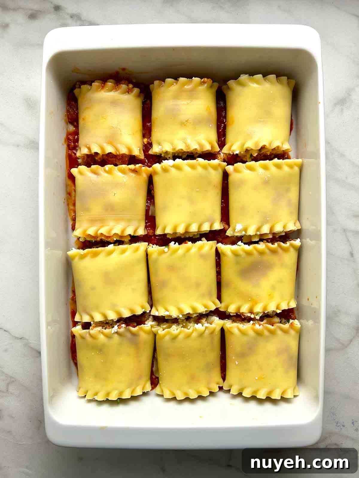 rolls placed on baking dish.