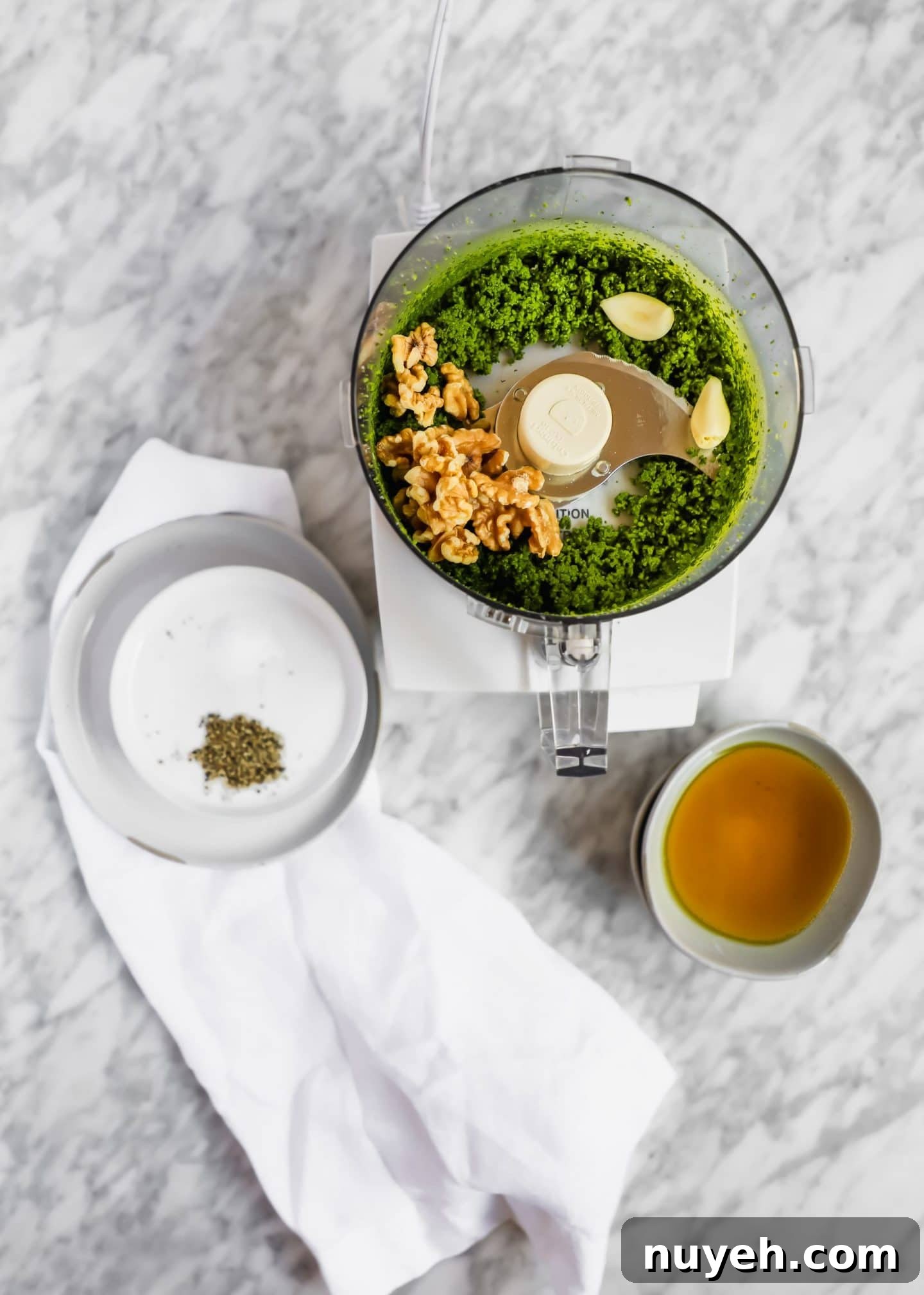 walnuts and garlic with kale pesto in food processor