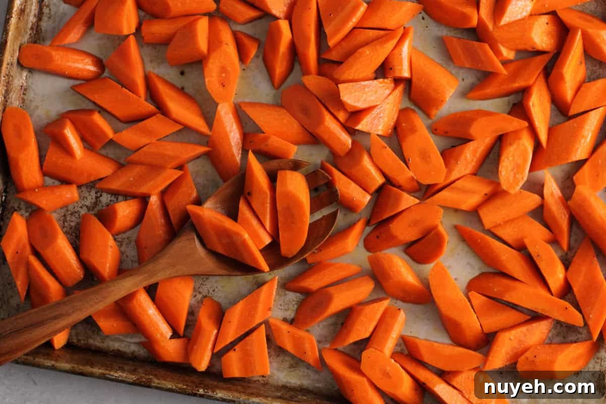 cut carrots on baking sheet