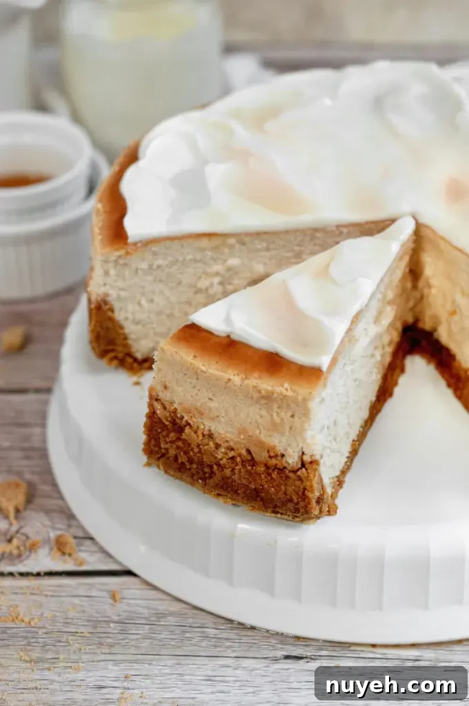 Golden brown honey cheesecake with white topping and honey drizzle