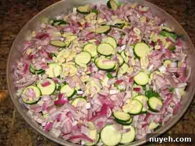 Add onions and garlic.
