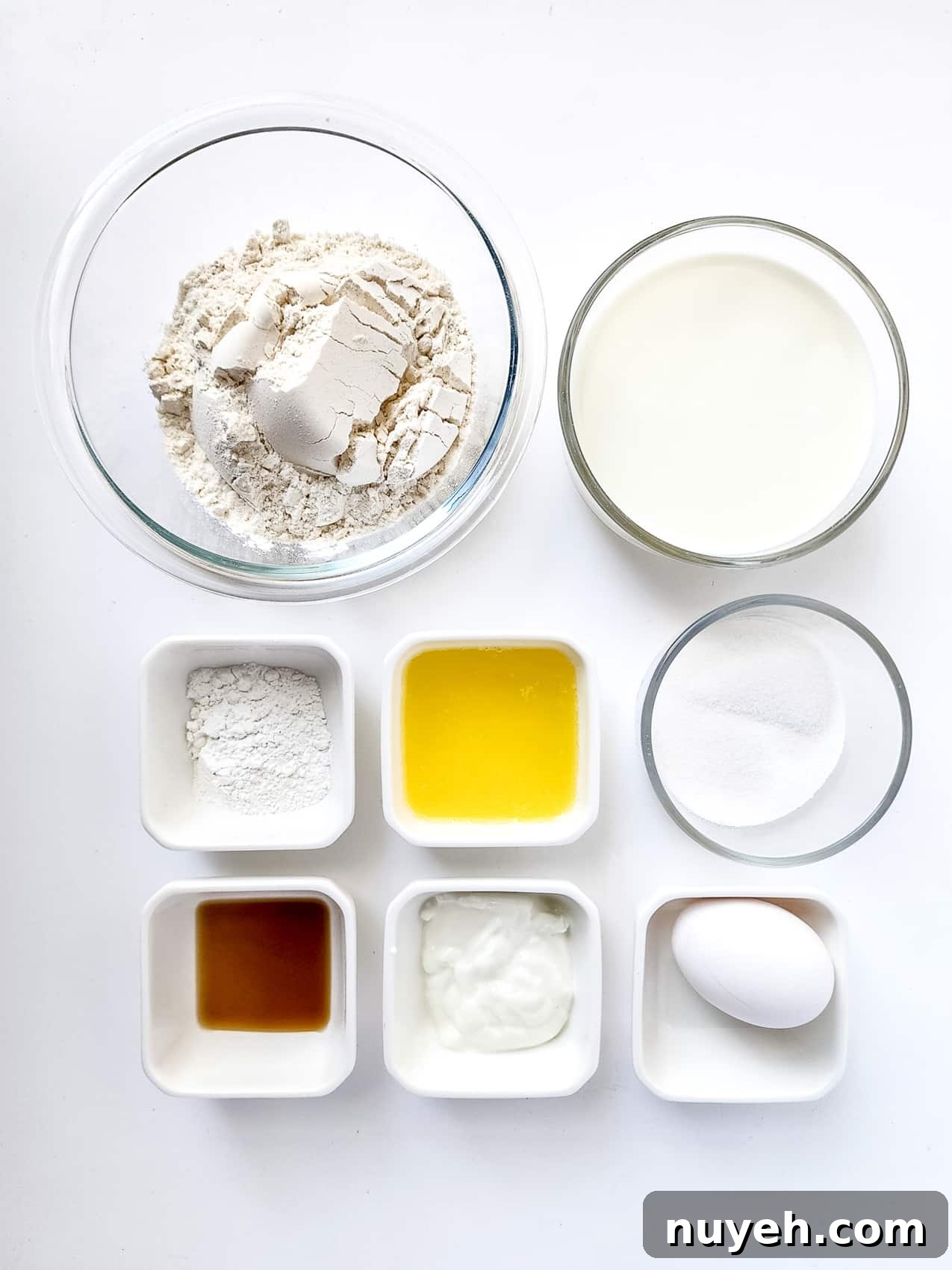 all the ingredients for spaghetti pancakes in separate small glass dishes