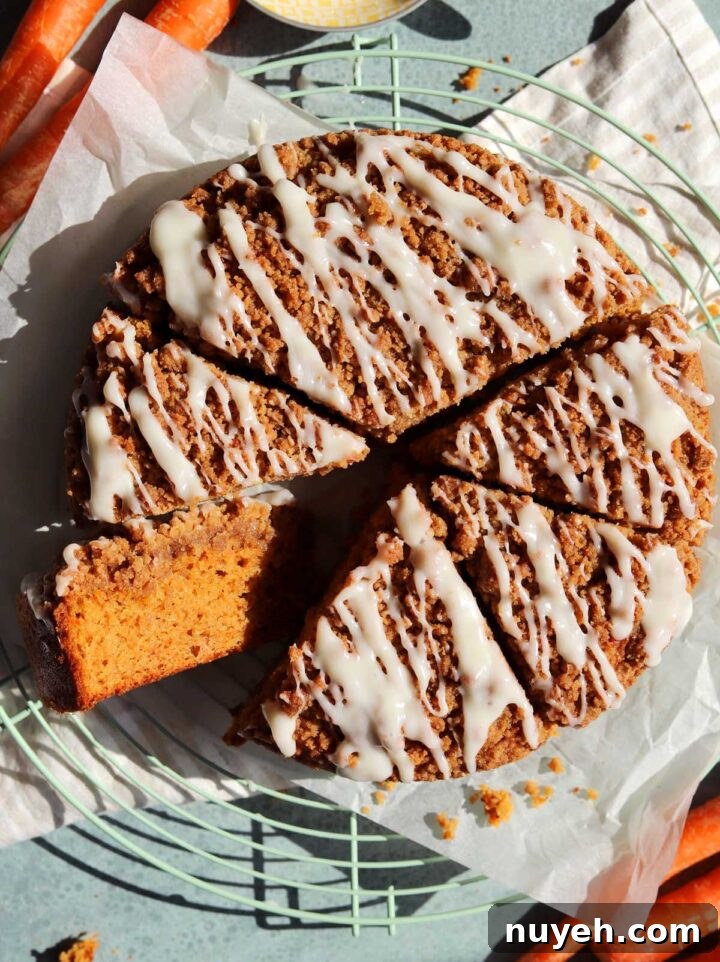 top view of carrot cake coffee cake sliced on wire rack