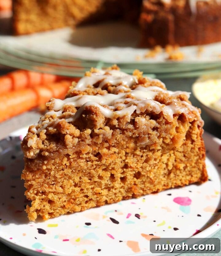 carrot cake coffee cake slice on a plate