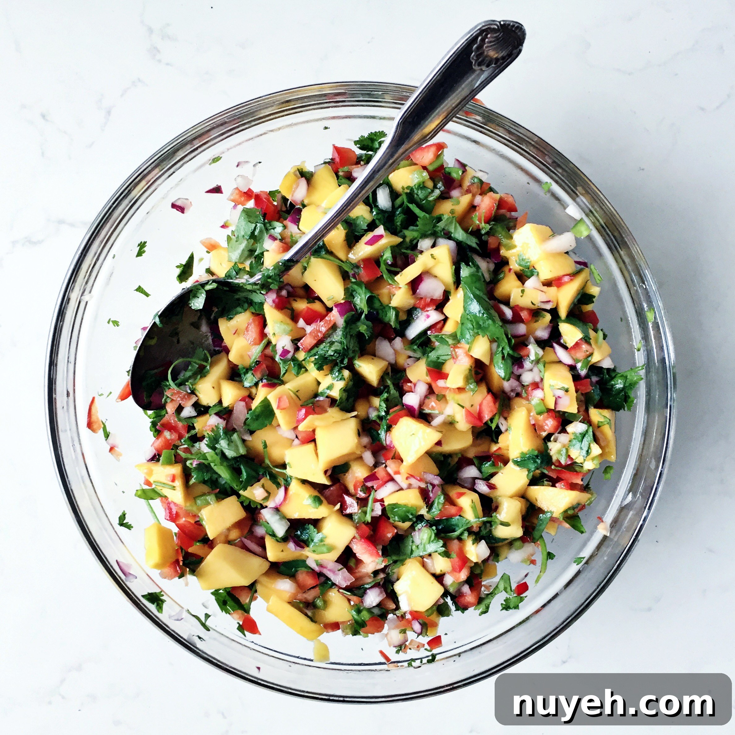 Mango Salsa in clear glass bowl