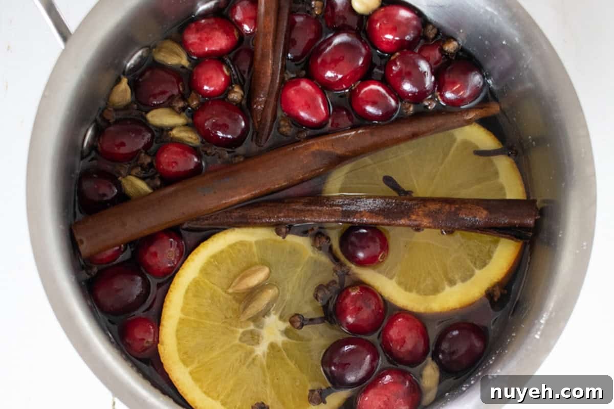 DIY Stovetop Potpourri with Essential Oils 7 Looking down into a pot of stovetop potpourri.
