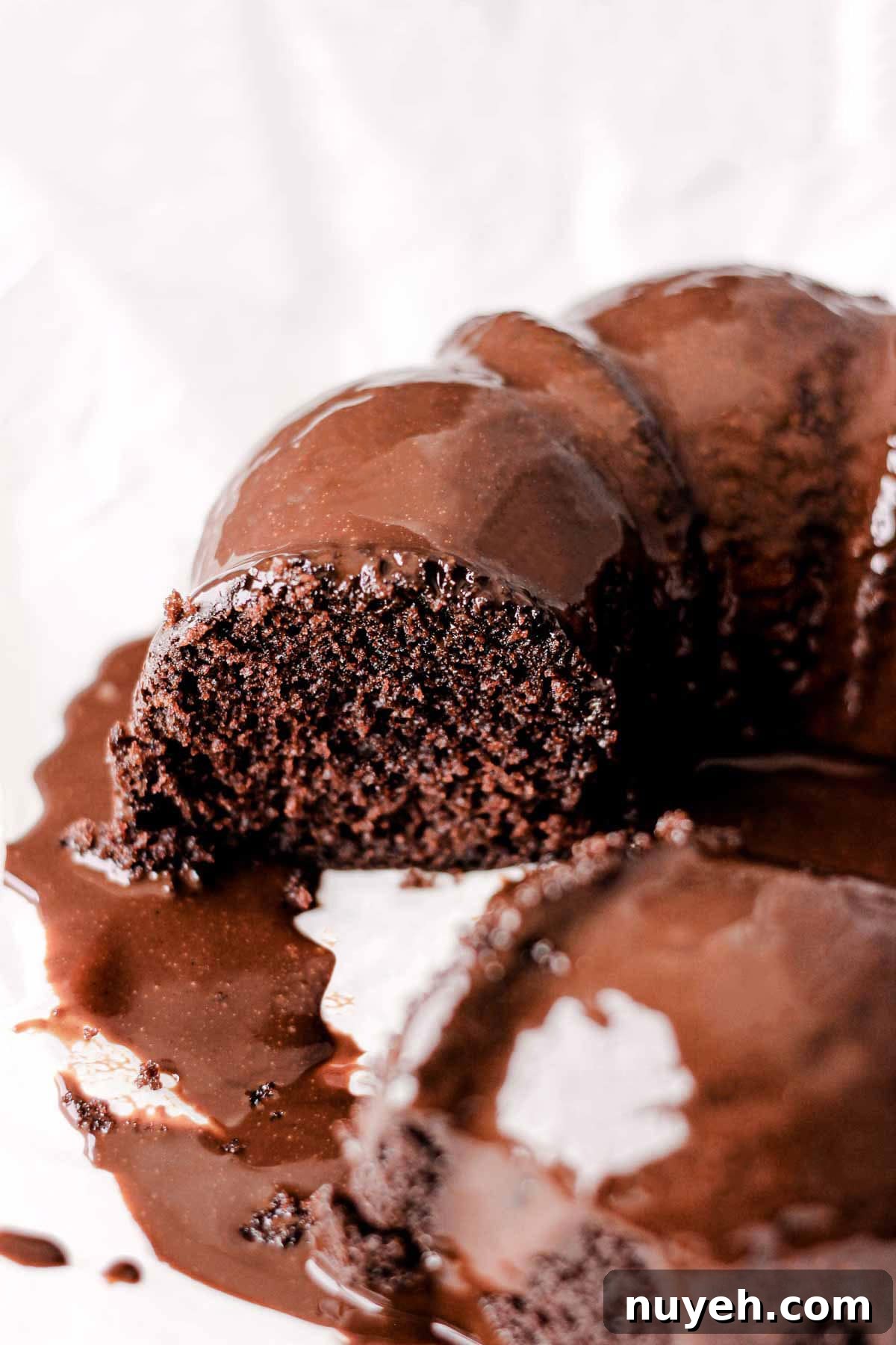 Decadent Chocolate Peanut Butter Bundt Cake Recipe 7 chocolate glazed chocolate bundt cake on parchment paper