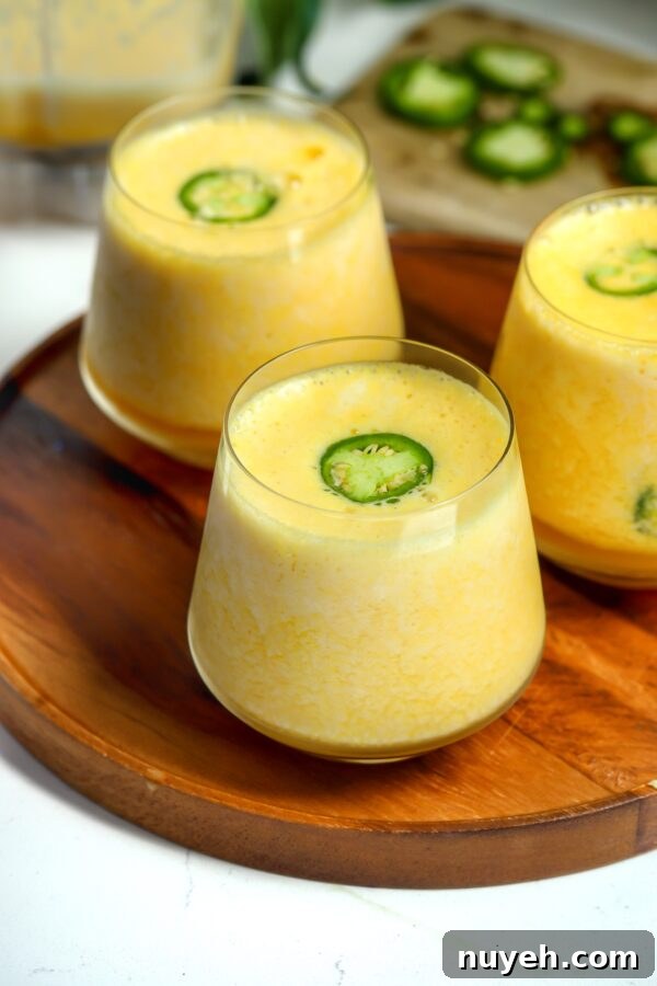 A delicious frozen alcohol wine recipe with a jalapeño on top.