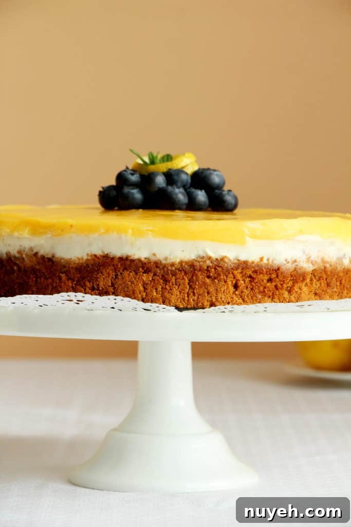 cheesecake with lemon curd on cake stand