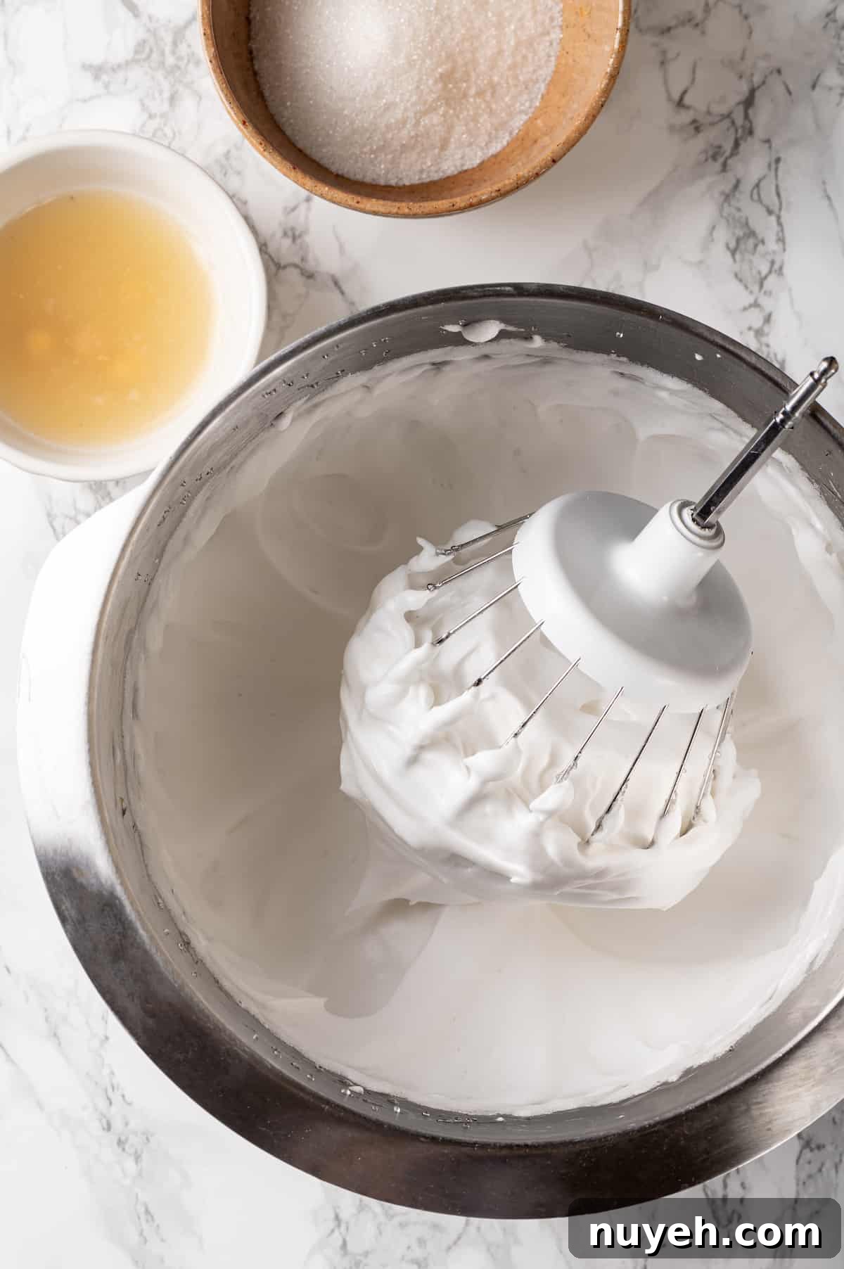 Here are the best vegan egg substitutes for baking and cooking! Learn why they work and when (and how) to use them. Vegan egg on whisk attachment in mixer bowl
