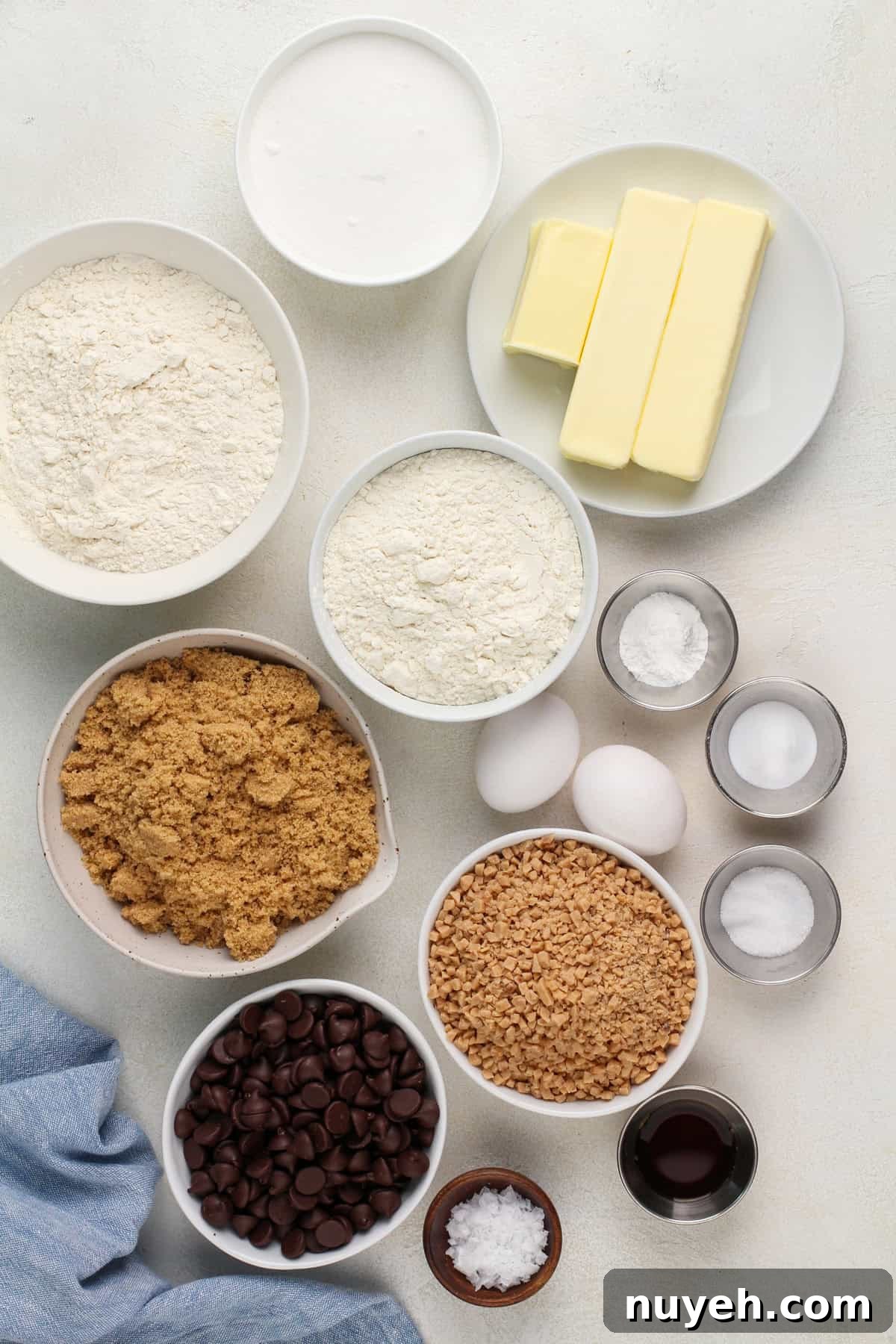 Ingredients for heath bar cookies arranged on a countertop.