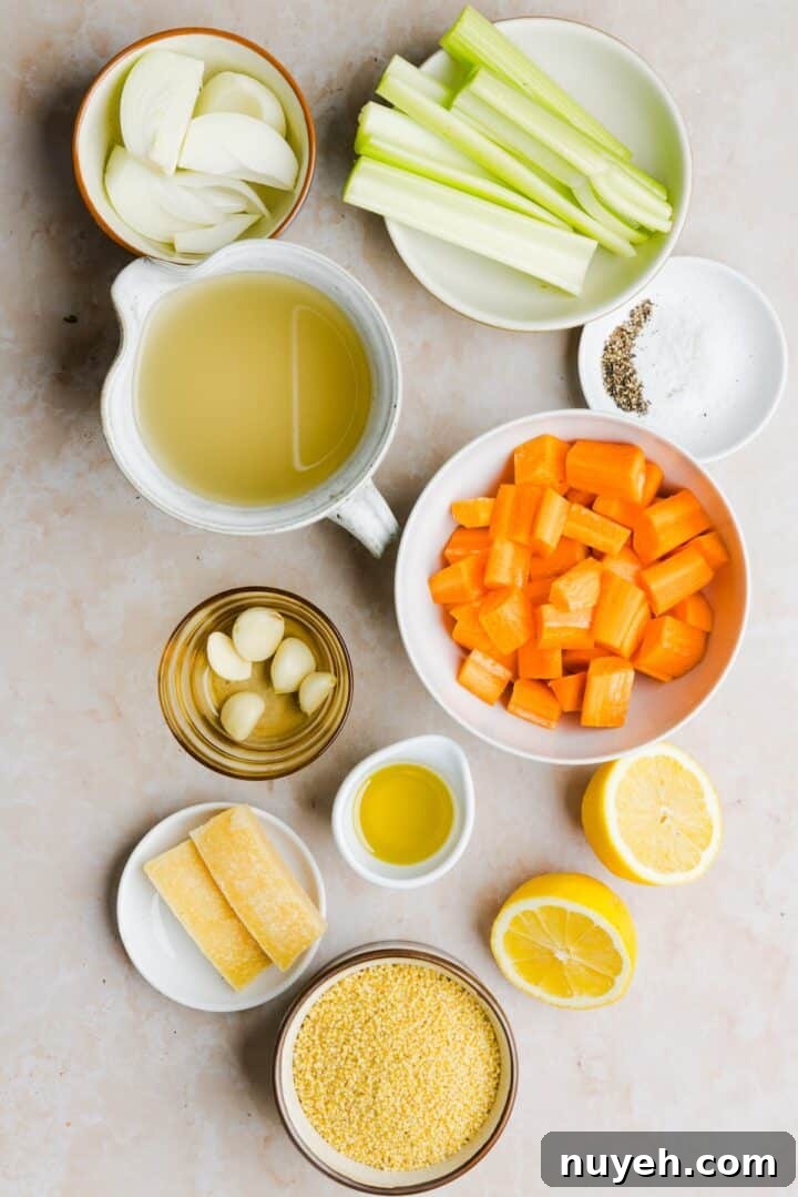 Ingredients for Italian penicillin soup displayed in small bowls on a beige marble counter