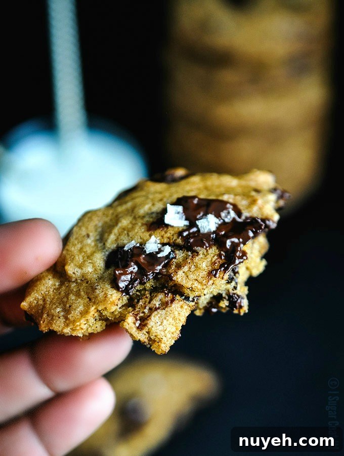Browned Butter Mascarpone Chocolate Chunk Cookies flaunt perfectly crisp edges and a melt-in-your-mouth, chewy centre, stuffed with dark chocolate chunks.