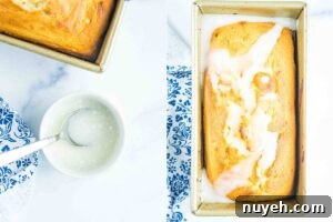 Lemon bread in a loaf pan fresh from the oven, drizzled with a white glaze, next to a bowl of extra glaze and a spoon.
