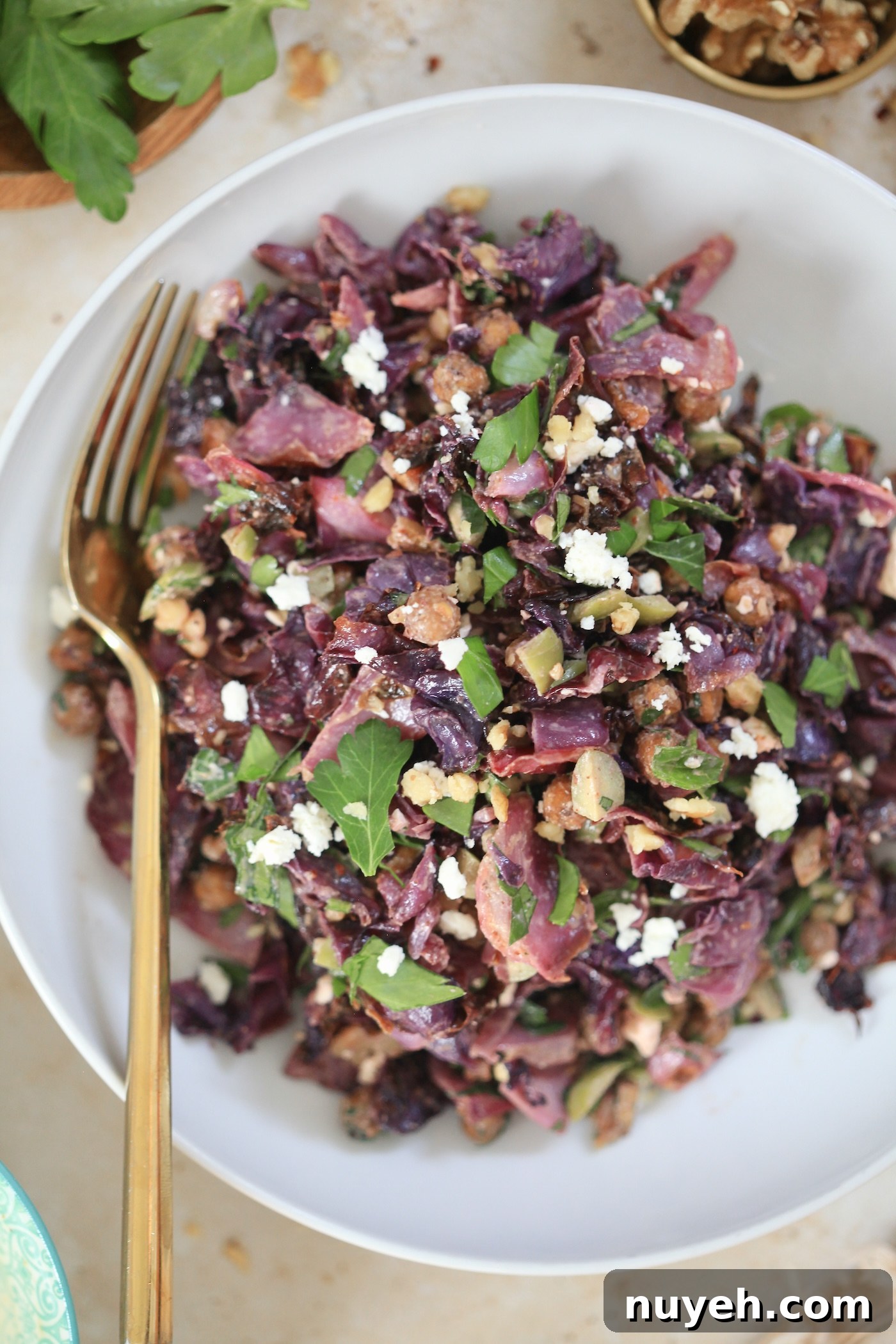 white bowl with cabbage salad up close.