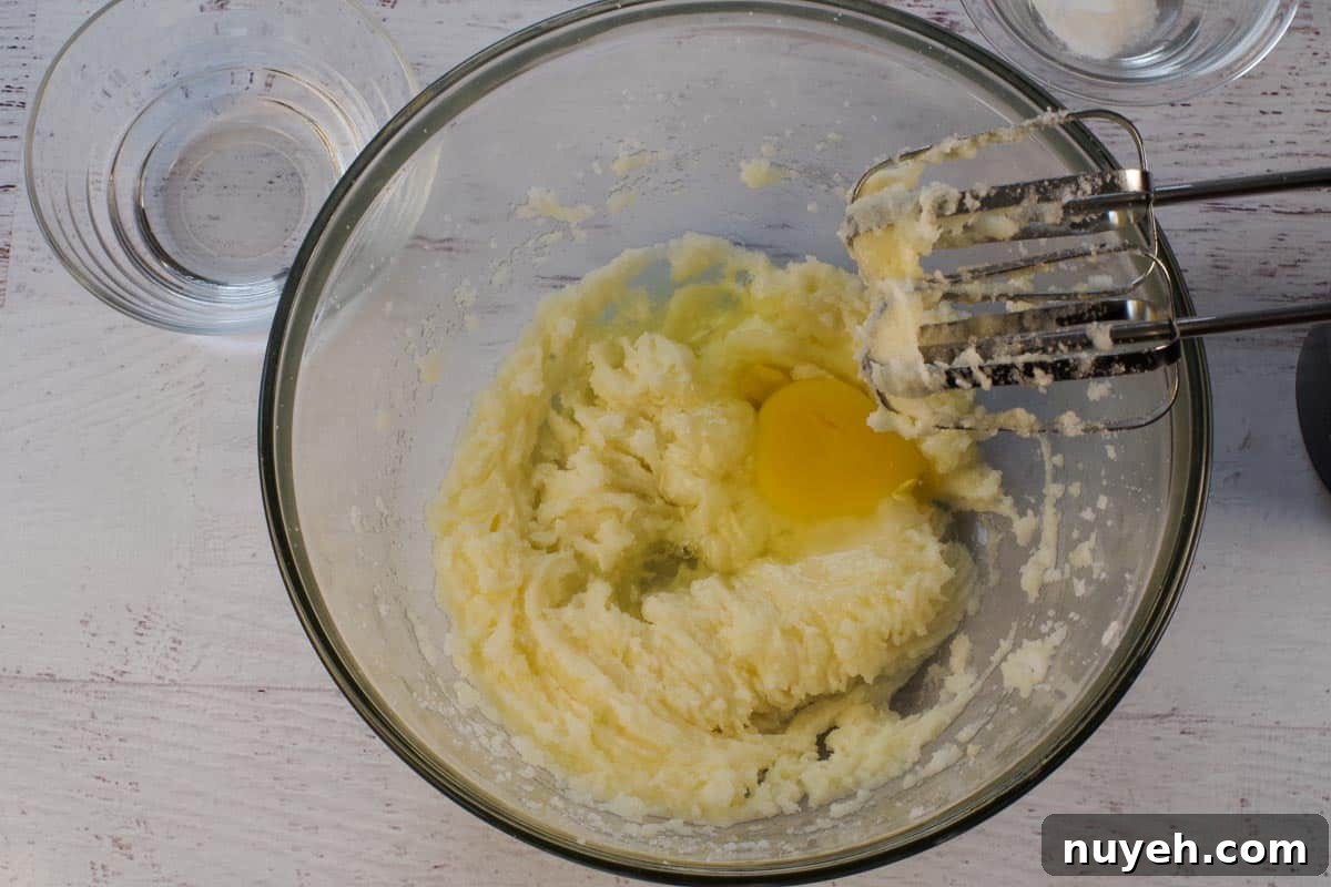 Eggs added to shortening sugar mixture.