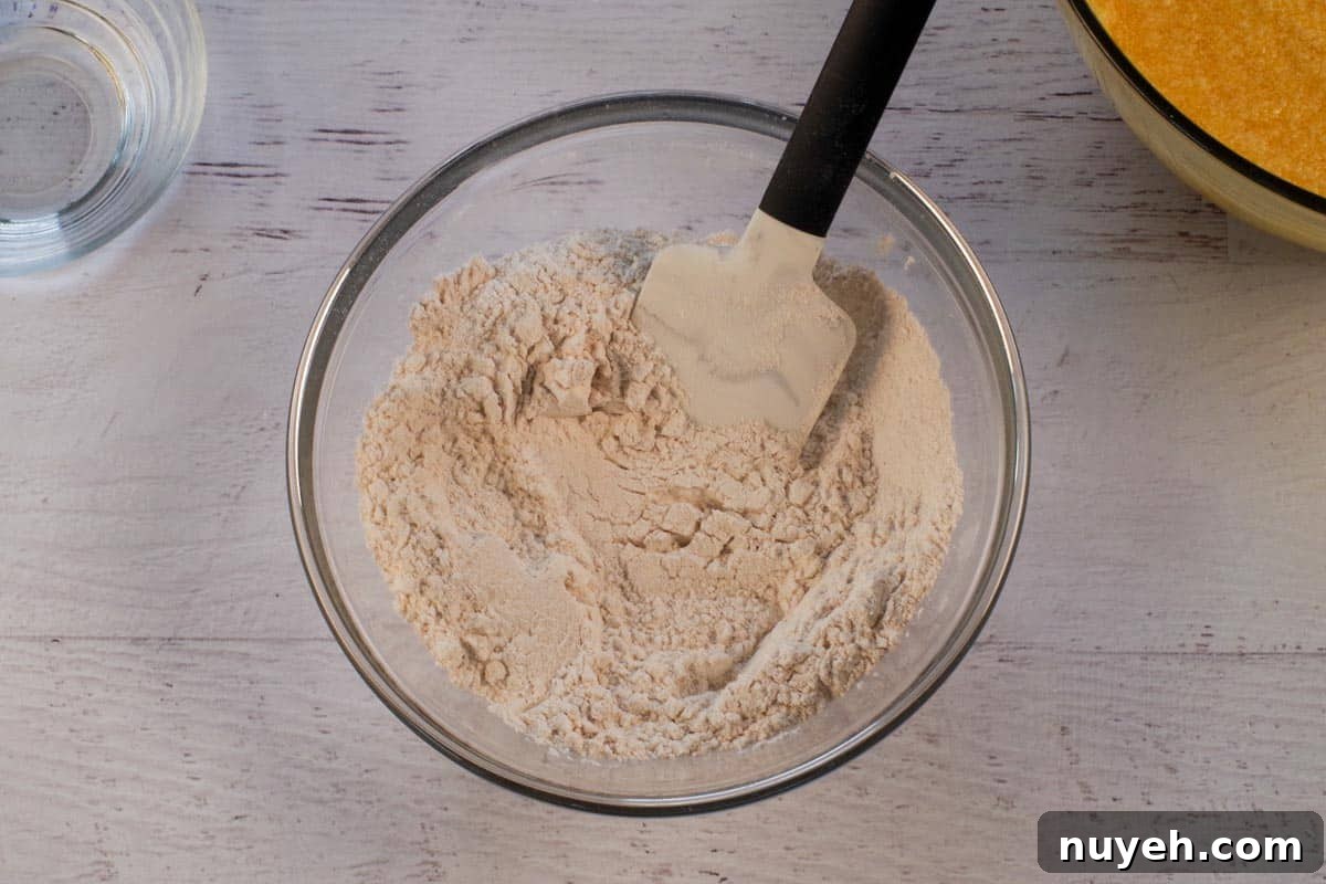 Dry ingredients in medium glass bowl.