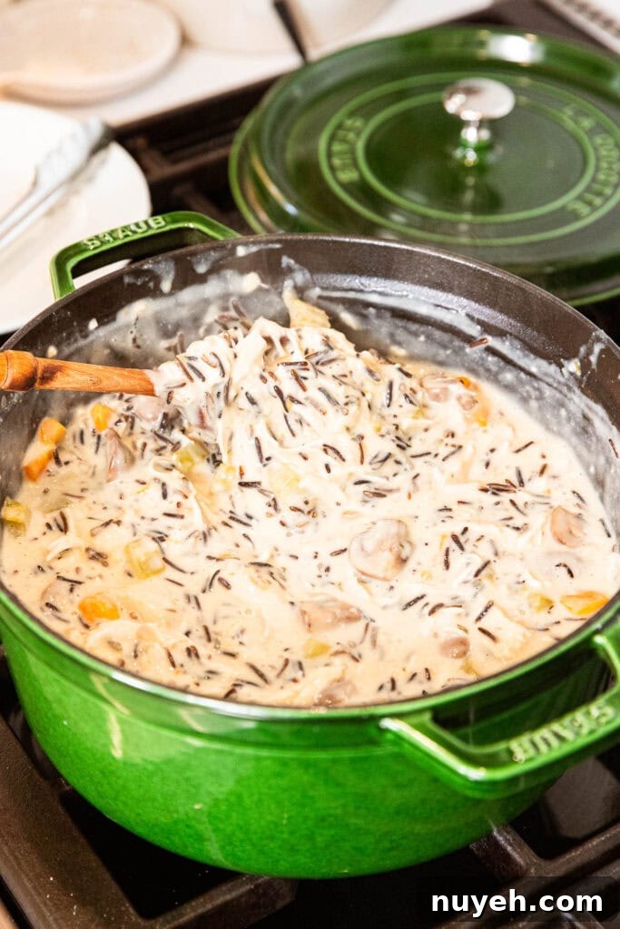 Creamy Chicken and Wild Rice Soup Recipe 12 Chicken and wild rice soup warms over heat.