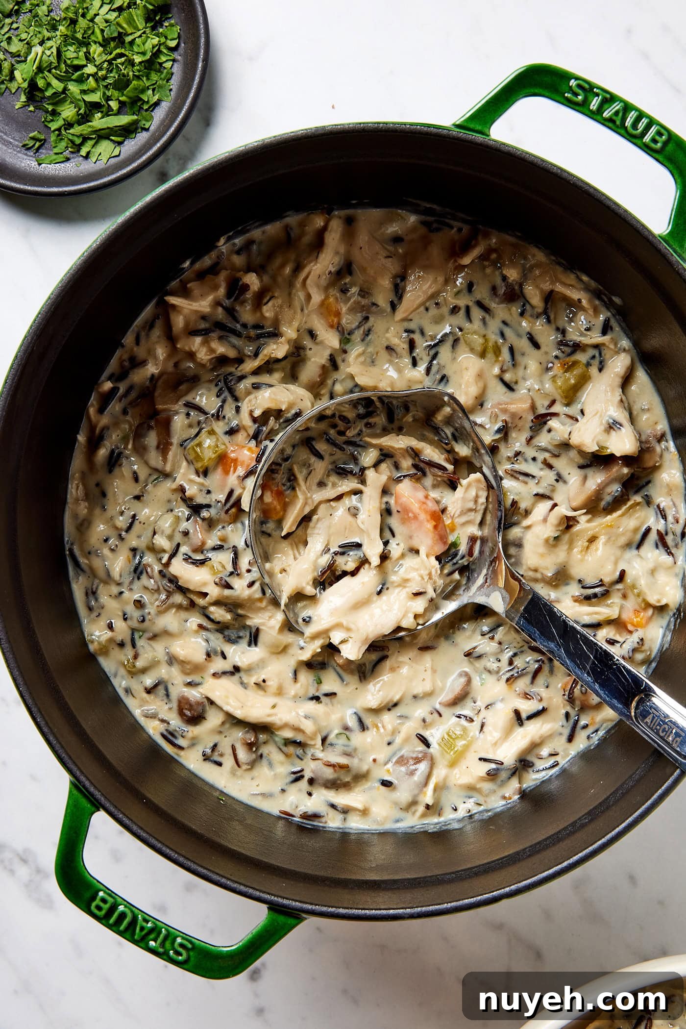 Creamy Chicken and Wild Rice Soup Recipe 14 Chicken and wild rice soup in a pot.