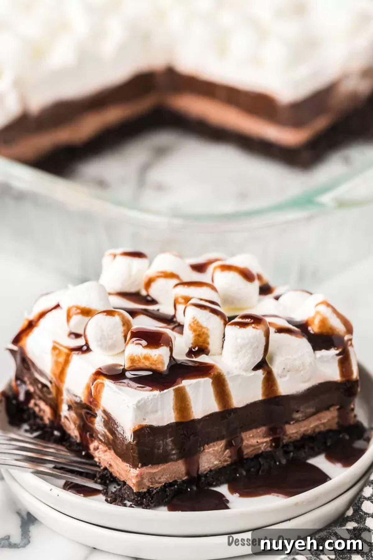 Slice of hot chocolate lasagna on plate.