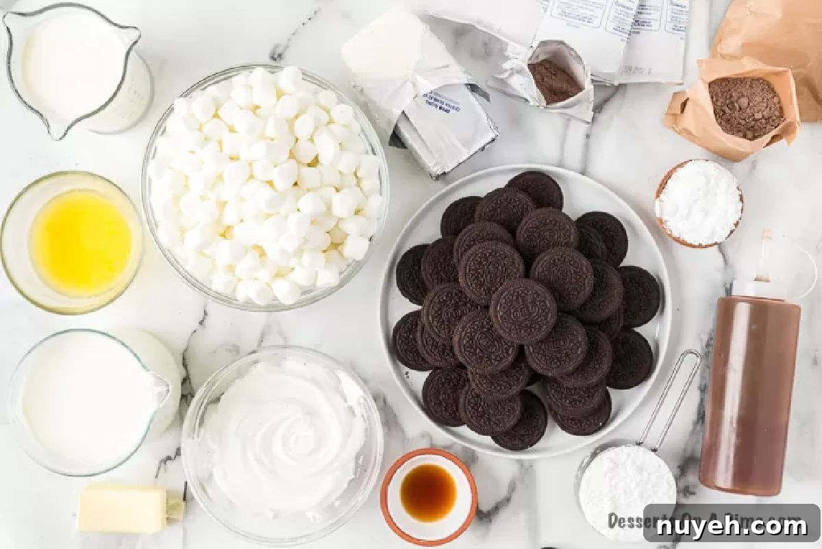 Ingredients to make this Hot Chocolate Lasagna Recipe - marshmallows, oreo cookies, butter, cream cheese, powdered sugar, vanilla, cool whip, pudding, heavy cream, chocolate topping.