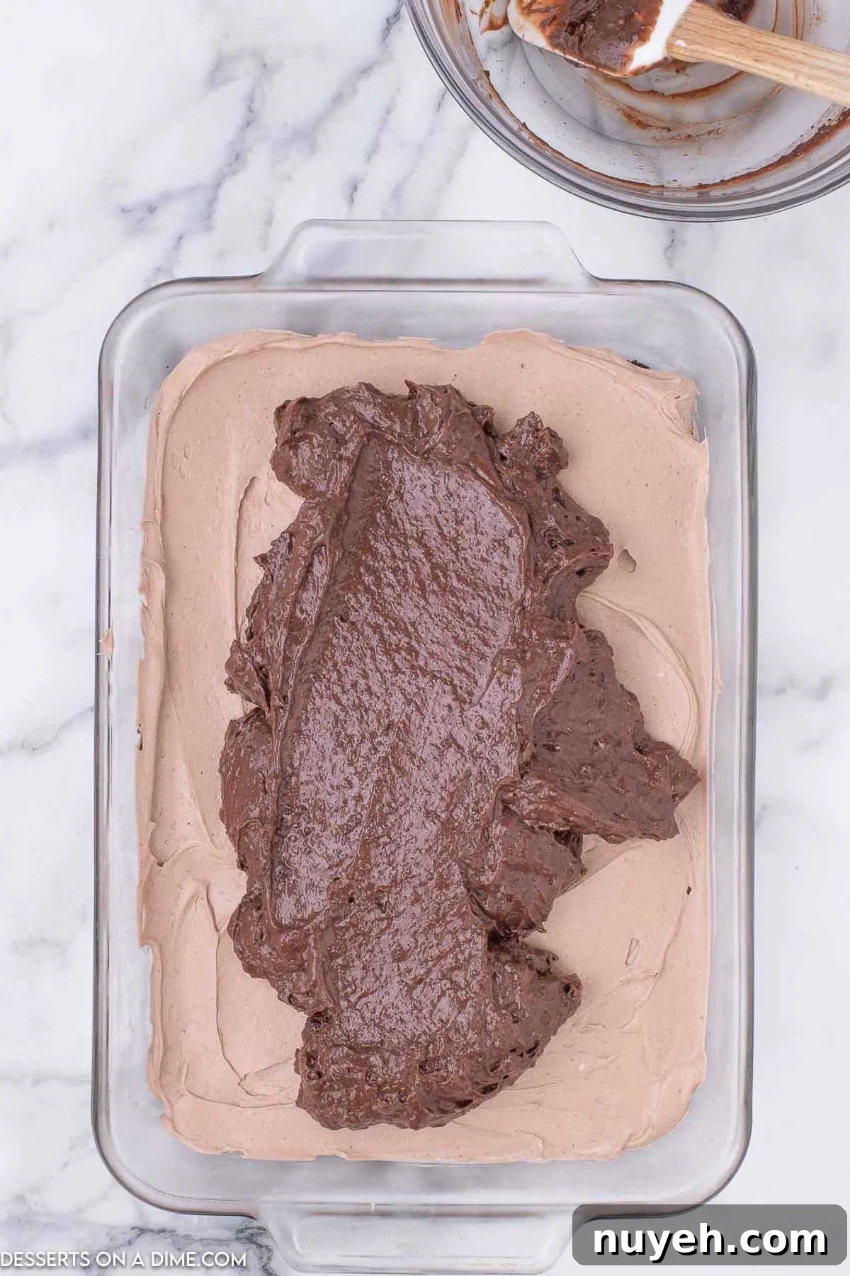 Pudding layer spread over mousse layer.