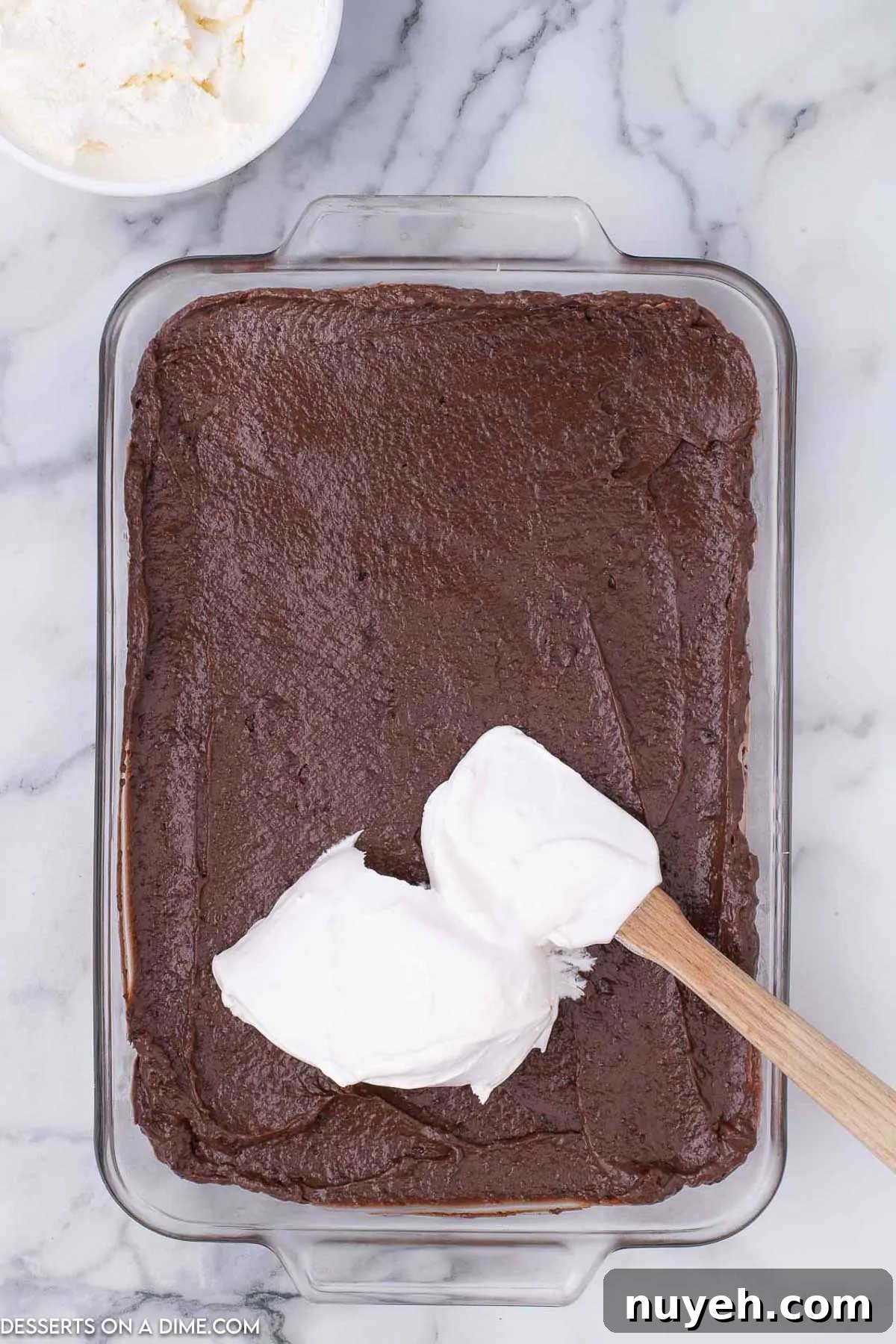 Cool whip spread over top.