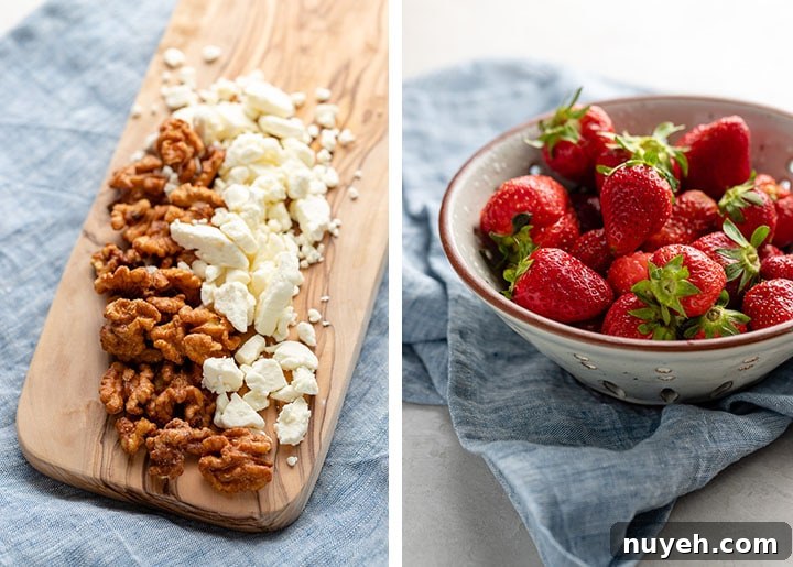 Walnuts and crumbled feta on a cutting board, and just-washed strawberries in a ceramic colander.