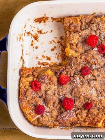 Raspberry and confectioner sugar topped over the casserole bake.