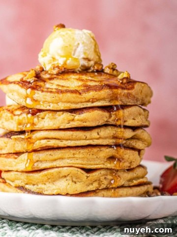 Fluffy oat flour pancakes on a plate.