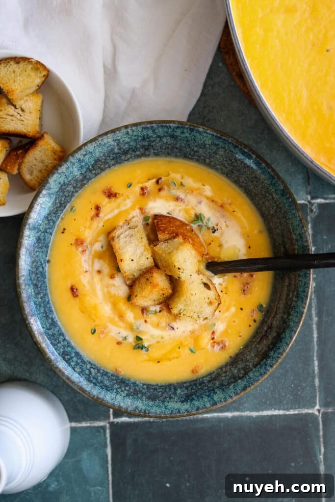Creamy One-Pot Roasted Butternut Squash Soup Recipe 2 roasted butternut squash soup with crouton, bacon pieces and a touch of cream.