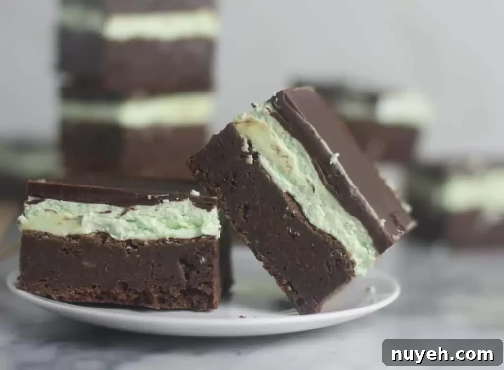 Grasshopper brownies with mint buttercream and chocolate glaze