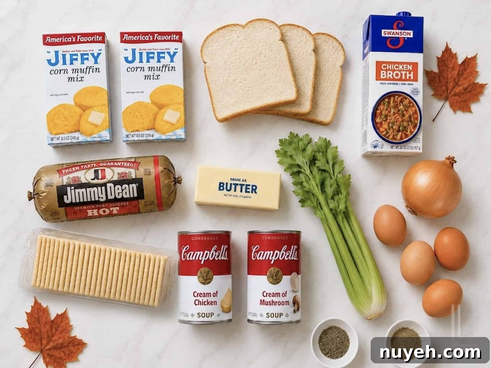 ingredients for Jiffy Cornbread Dressing, including white bread, saltines, cream of chicken soup, and hot breakfast sausage.