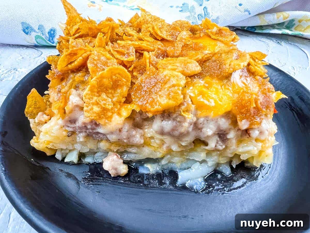 A plate of breakfast casserole on a black plate.