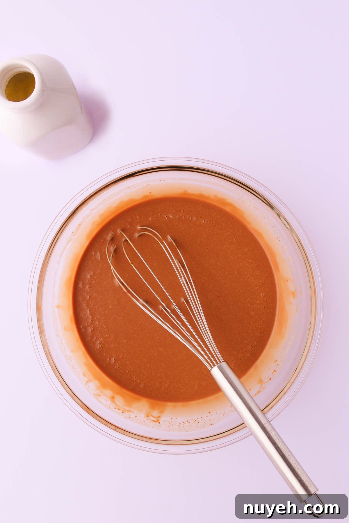 The chocolate mousse mixture, after being stirred with a whisk.