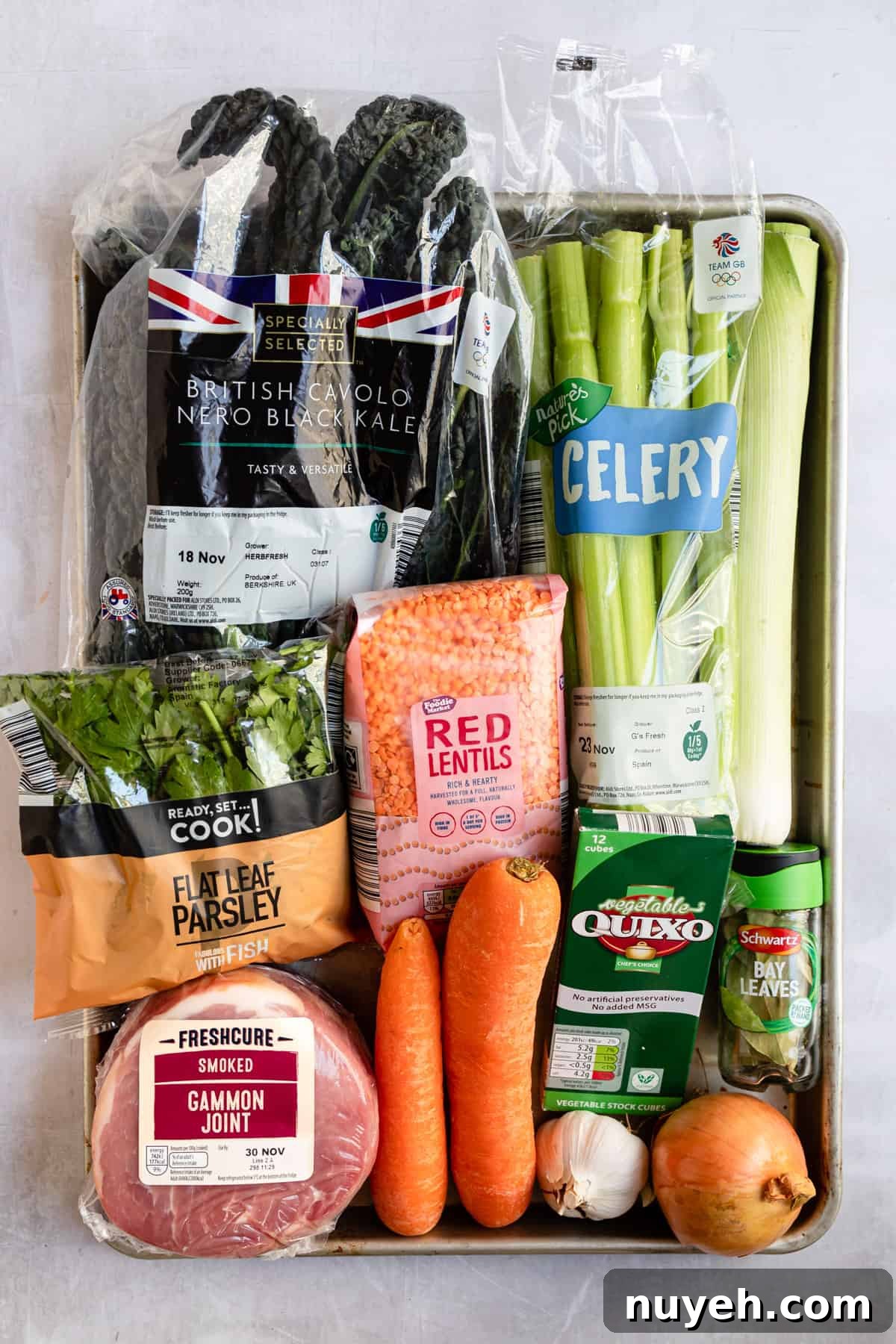 Slow Cooker Ham and Lentil Soup Recipe 3 Aldi ingredients on a baking tray.