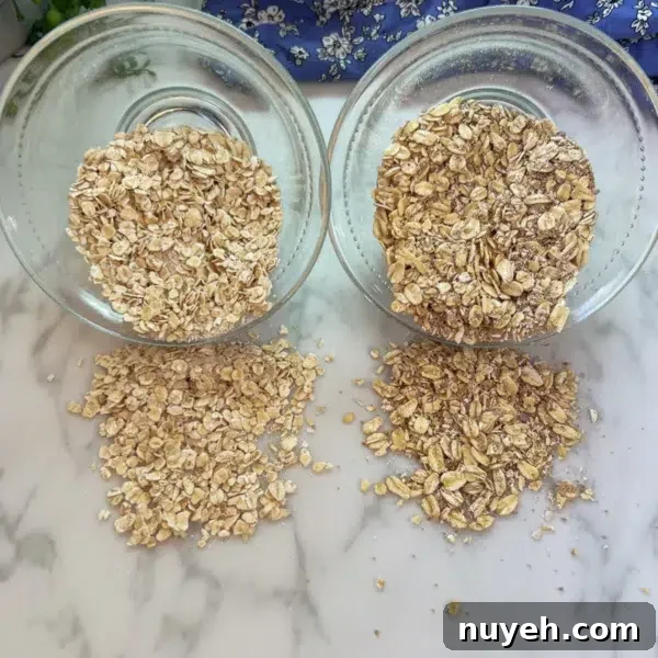 two glass bowls tipped with dry oatmeal mix the left bowl is store bought instant oat mix with small flakes and the right one is homemade instant oatmeal mix with mixture of texture large and chopped flakes